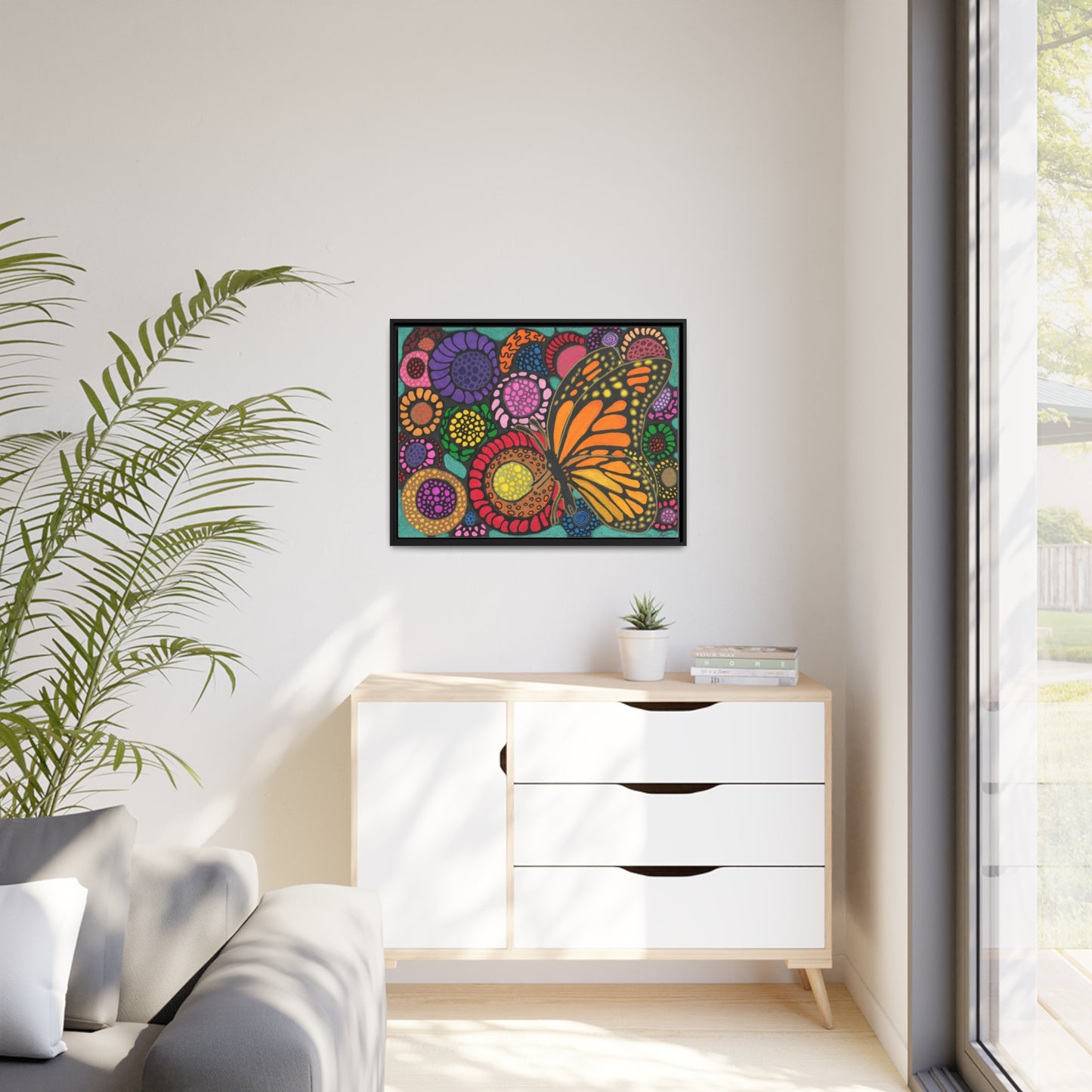 Butterfly with flowers on canvas with black wood frame